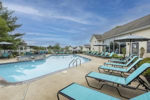 Apartments in Limerick, Pennsylvania - Pool with Lots of Lounge Seating