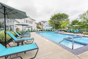 Apartments in Limerick, Pennsylvania - Swimming Pool with Sundeck and Lounge Chairs