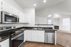 Two Bedroom Apartments in Limerick, Pennsylvania - Newly Renovated Kitchens with Black Granite Countertops and view to Living Room