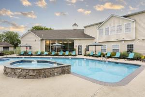 Apartments in Limerick, Pennsylvania - Swimming Pool and Patio with Hot Tub