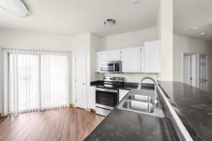 One Bedroom Apartments in Limerick, Pennsylvania - Kitchen with Balcony Access and Tons of Natural Light
