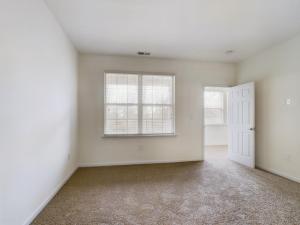 An empty room with white walls.